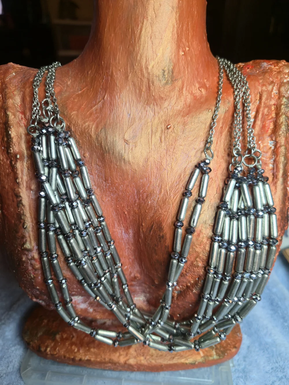 multi-strand statement necklace by Chico's features layered silver-tone tube